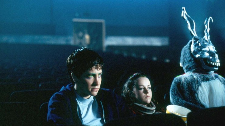 Donnie (Jake Gyllenhaal), Gretchen (Jena Malone) and Frank (James Duval) take in a movie.